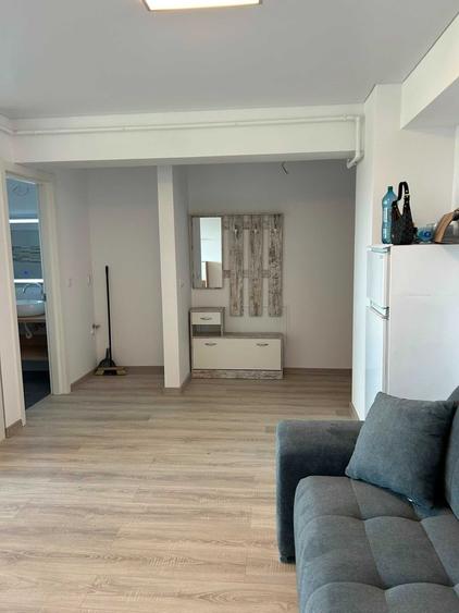 Apartament cu 2 camere semidecomandat în Rediu