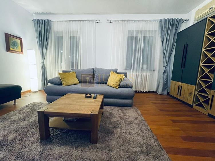Apartament cu 2 camere semidecomandat, mobilat în Take Ionescu