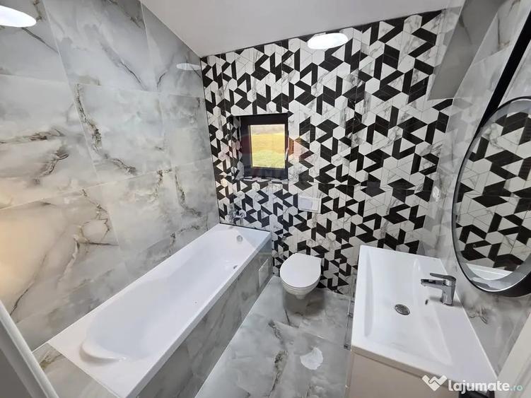 Casă cu 4 camere cu Teren 310 Mp în Vânători