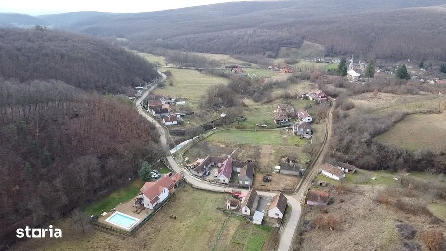 Casă cu 4 camere cu Teren 1625 Mp în Păuliș