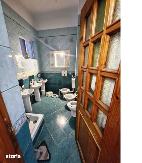 Casă cu 7 camere cu Teren 340 Mp în Muncii