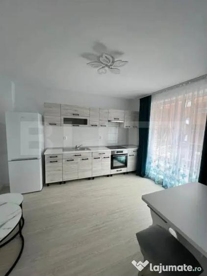 Apartament cu 2 camere semidecomandat în Chinteni