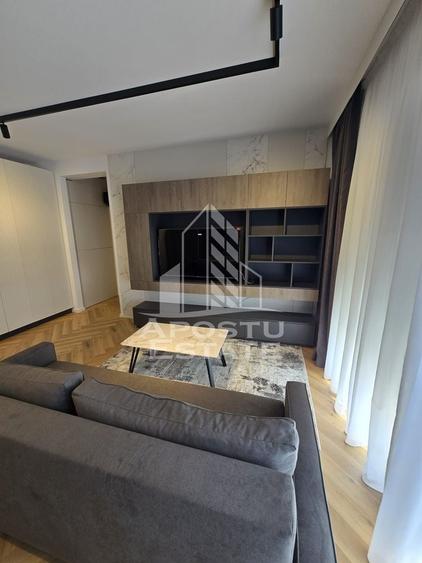 Apartament cu 2 camere semidecomandat, mobilat în Aradului