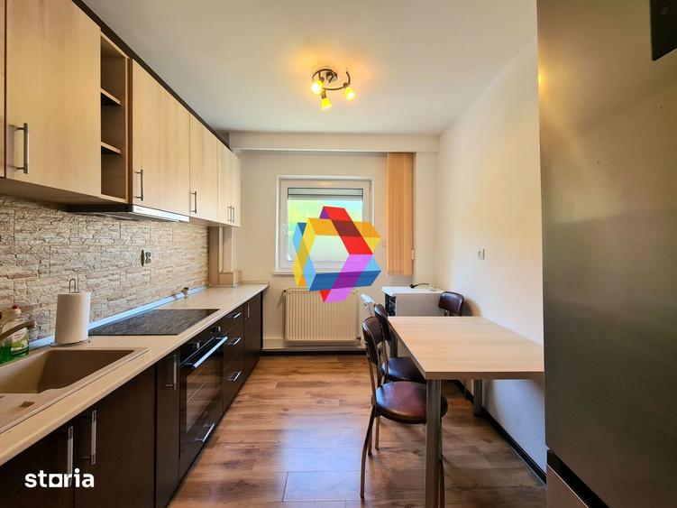 Apartament 3 camere de vanzare, zona Racadau , 76 mp, spatii-comercial - 1