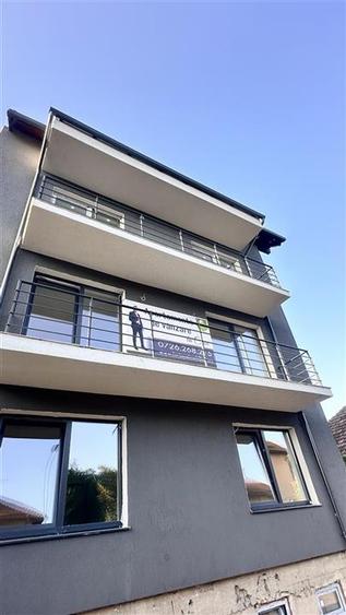 Apartament cu 3 camere decomandat în Tractorul