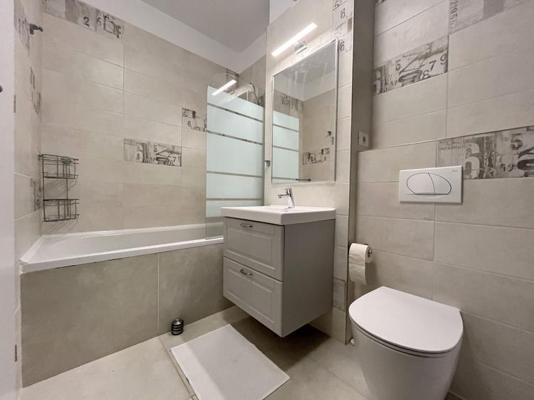 Apartament cu 2 camere semidecomandat, mobilat în Central