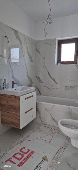 Casă cu 4 camere cu Teren 350 Mp în Domnești