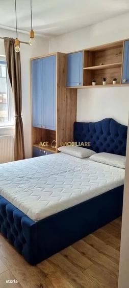 Apartament cu 2 camere semidecomandat, mobilat în Regie