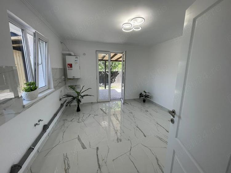 Casă cu Teren 370 Mp în Bucium