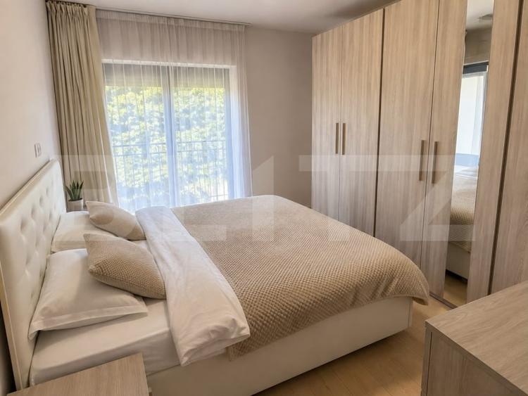 Apartament cu 3 camere semidecomandat, mobilat în Borhanci