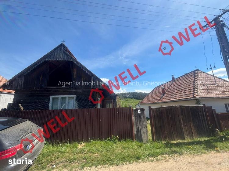 Casa din lemn cu teren de vanzare in Valea Seaca!