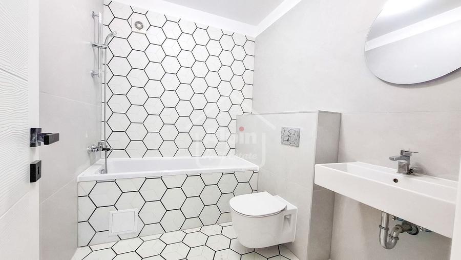 Apartament cu 3 camere decomandat în Tractorul