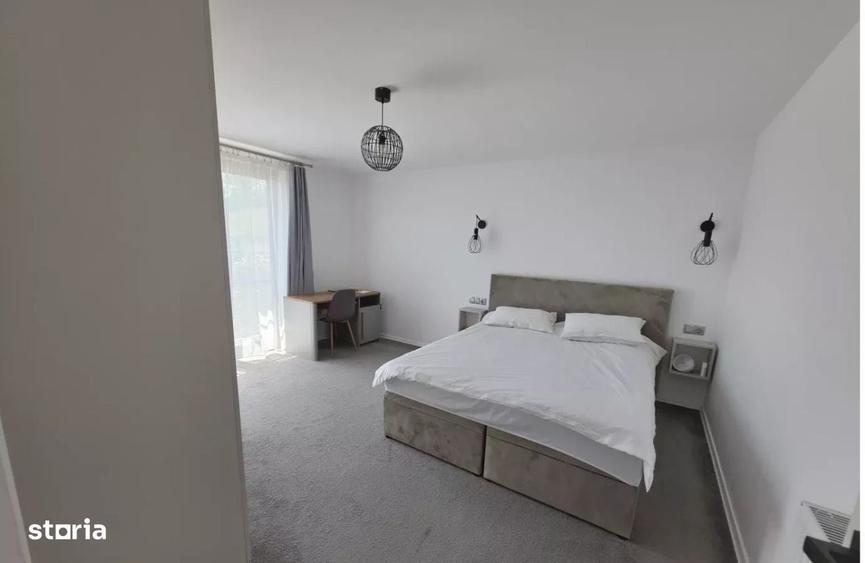 Casa individuala de vanzare cu 4 camere, amplasata pe un teren de 412 - 4