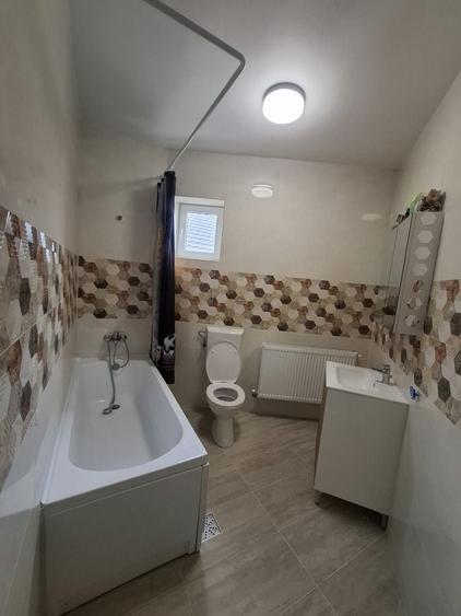 Casă cu 4 camere în Adunații-Copăceni