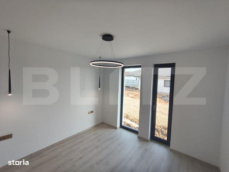 Casă cu 4 camere cu Teren 500 Mp în Sânmartin