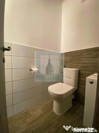 Apartament cu 3 camere decomandat în Tractorul