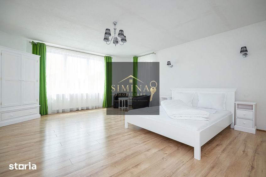 Casă cu 9 camere cu Teren 1000 Mp în Păsăreni