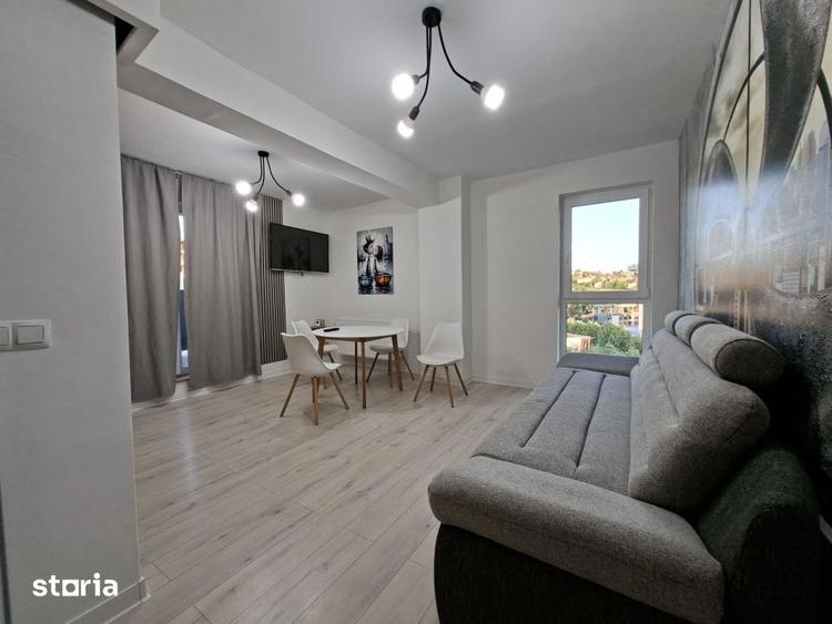 Apartament cu 2 camere semidecomandat, mobilat în Dâmbul Rotund