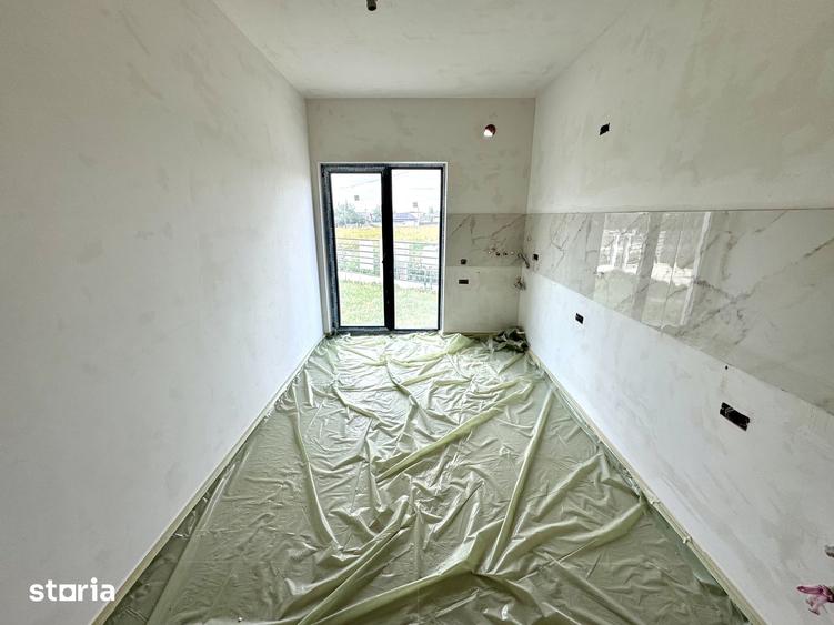 Casă cu 4 camere cu Teren 200 Mp în Holboca