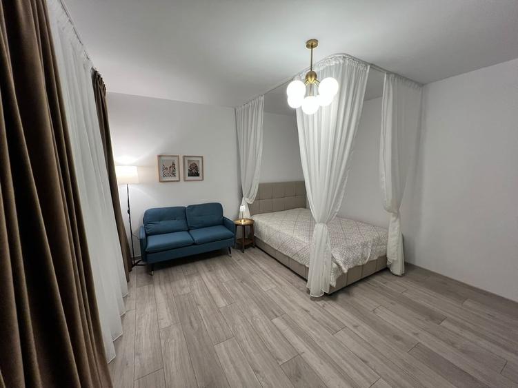 Garsonieră decomandată în Titan