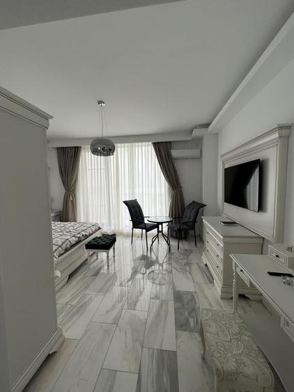 Penthouse cu 3 camere decomandat, mobilat în Mamaia