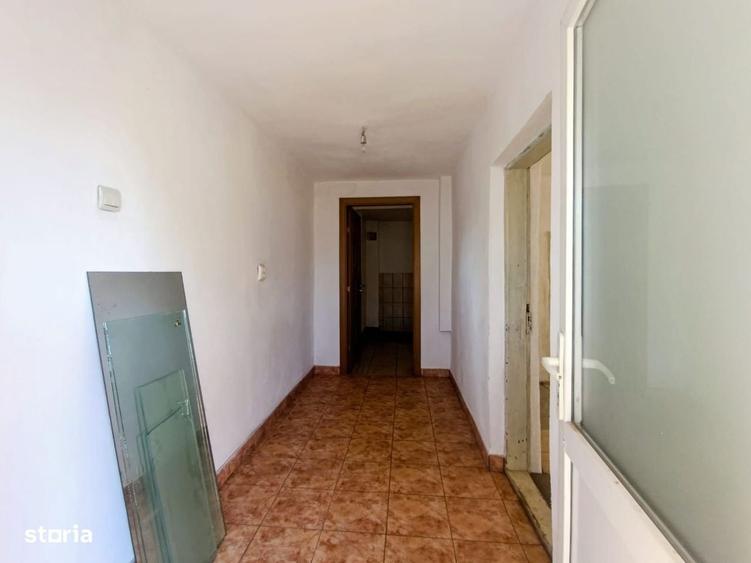 Casă cu 4 camere cu Teren 1200 Mp în Central