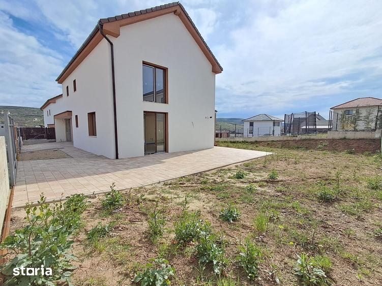 Casa cuplata prin garaj 23 mp, sup.totala 147 mp,teren 400 mp Chinteni - 12