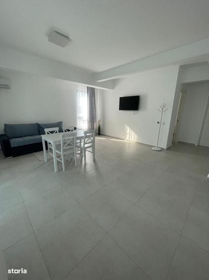 2 camere 54mp - etaj 8/10 - mobilat - loc parcare subteran - INTABULAT - 9