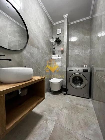 Apartament cu 2 camere semidecomandat, mobilat în Borhanci