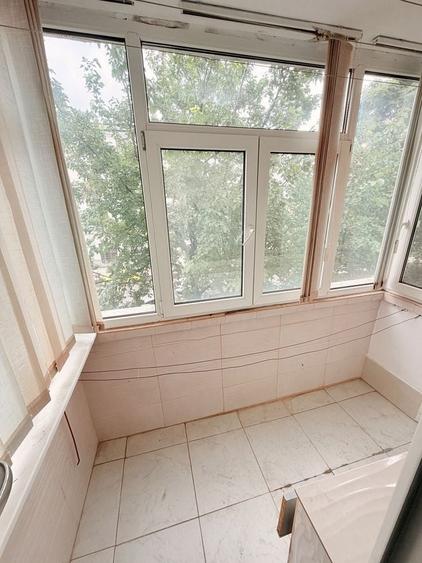 Apartament cu 3 camere semidecomandat în Cuza Vodă