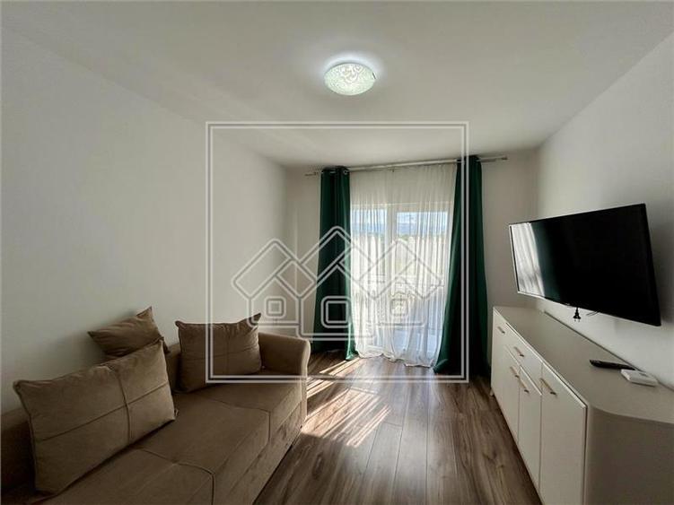 Apartament cu 2 camere, decomandat + balcon, 2 locuri de parcare - 4