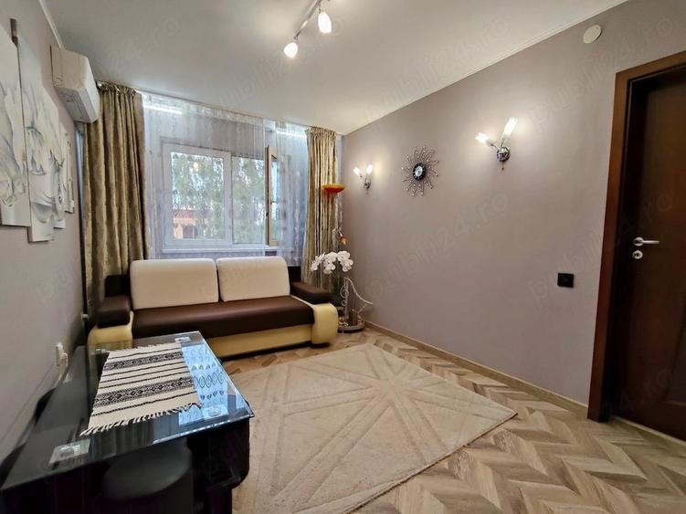 Apartament cu 3 camere semidecomandat în Florilor
