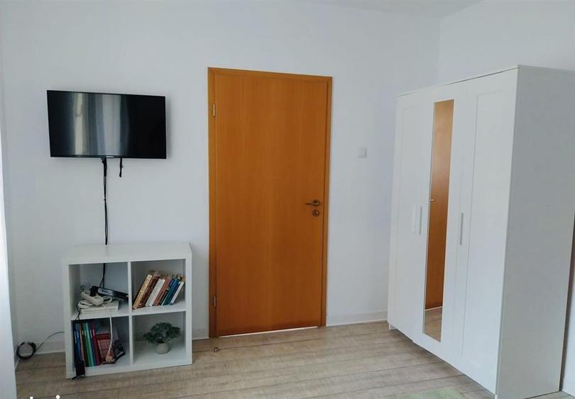 Casă individuală cu 2 camere cu Teren 100 Mp în Schei