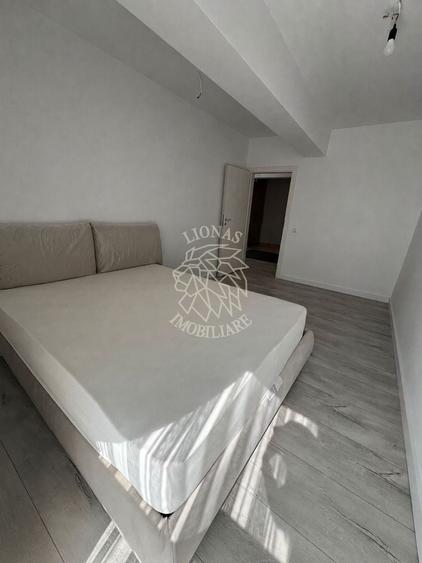 Apartament cu 2 camere semidecomandat, mobilat în Calea Moldovei