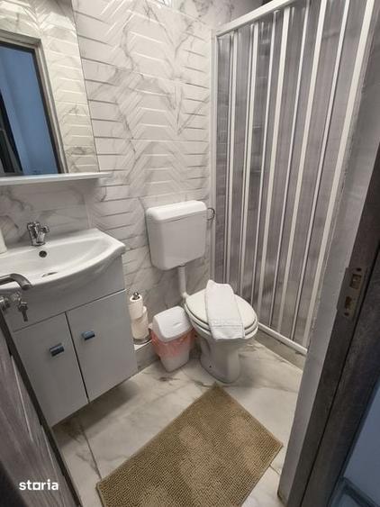 Casă cu 2 camere cu Teren 38 Mp în Romană