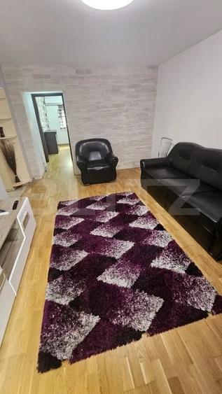 Apartament cu 2 camere semidecomandat, mobilat în Central