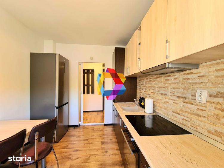 Apartament 3 camere de vanzare, zona Racadau , 76 mp, spatii-comercial - 2