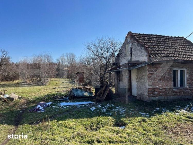 Casă cu 2 camere cu Teren 1500 Mp în Botizului