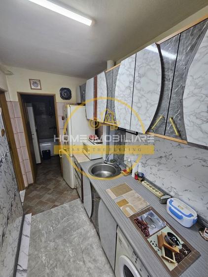 Apartament cu 3 camere semidecomandat, mobilat în Podu Roș