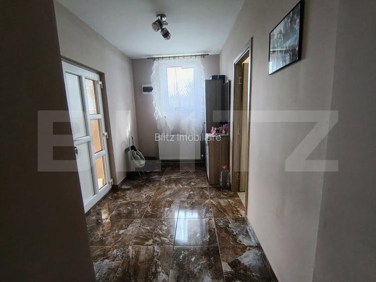 Casa cu 3 camere,baie, bucatarie, teren 500 mp