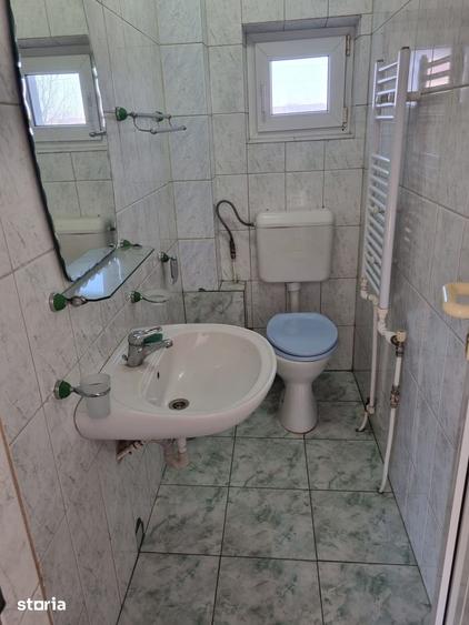 Casă cu 4 camere cu Teren 1202 Mp în Băcia
