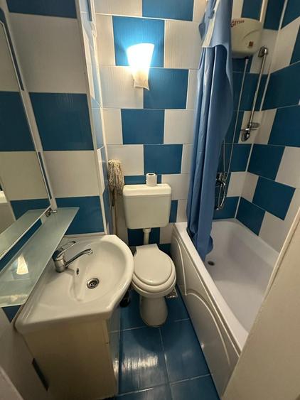 Garsonieră decomandată în Titan