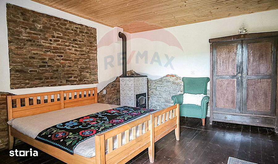 Casă cu 4 camere cu Teren 1631 Mp în Bruiu