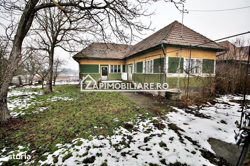 Casă cu 3 camere cu Teren 2700 Mp în Central