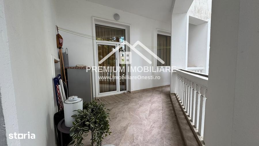 Apartament spa?ios cu 3 camere One?ti, zona centrala - 12