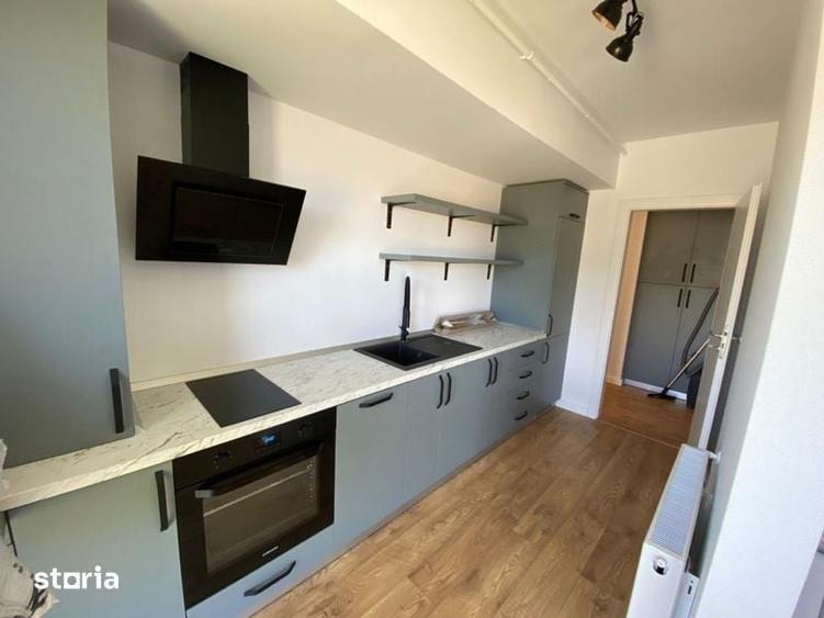 Apartament cu 2 camere decomandat în Tractorul