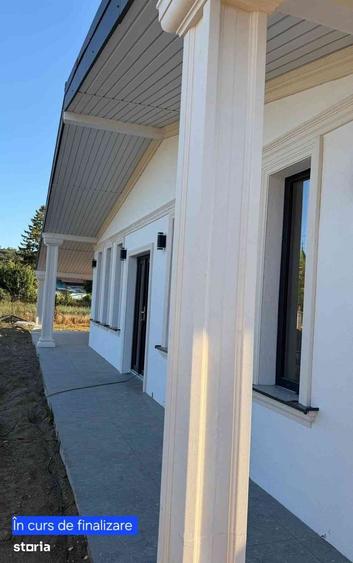 Casă cu 4 camere cu Teren 900 Mp în Podu Roș