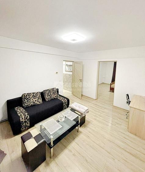 Apartament cu 2 camere semidecomandat, mobilat în Central