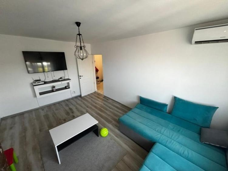 Apartament cu 3 camere decomandat, mobilat în Buzaului