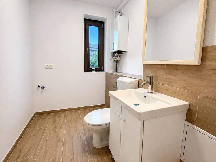 Apartament cu 3 camere decomandat, mobilat în Borhanci